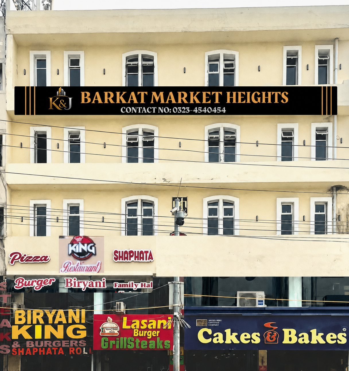 Front elevation of Barkat Market Heights premium boys' residence building in Lahore